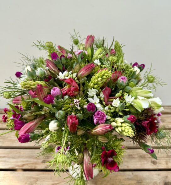 Fresh cut flowers. Hand-Tied Seasonal Bouquet - 100% British in April. Bouquet features Brodiaea, Dubium, Sweet William, Nigella, Alstroemeria, Scented Pinks. Vase not included.