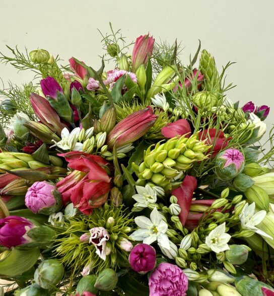 Fresh cut flowers. Hand-Tied Seasonal Bouquet - 100% British in April. Bouquet features Brodiaea, Dubium, Sweet William, Nigella, Alstroemeria, Scented Pinks. Vase not included.