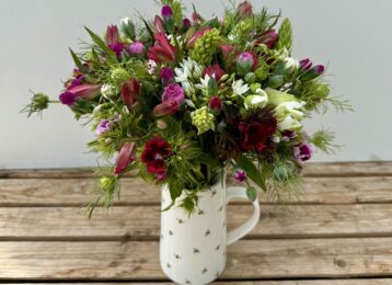 Fresh cut flowers. Hand-Tied Seasonal Bouquet - 100% British in April. Bouquet features Brodiaea, Dubium, Sweet William, Nigella, Alstroemeria, Scented Pinks. Vase not included.