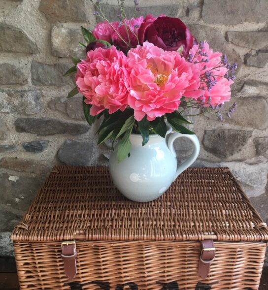 Peonies in mixed shades of pinks. Vase not included.
