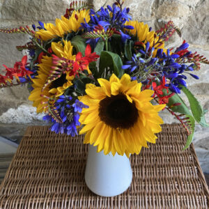 Sunflowers Agapanthus and Crocosmia